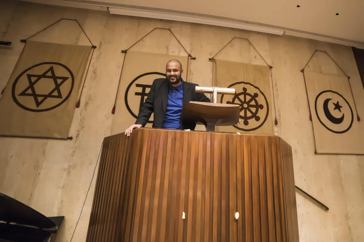 Rajiv at interfaith podium